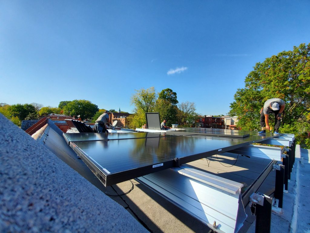 solar panels getting installed on rooftop